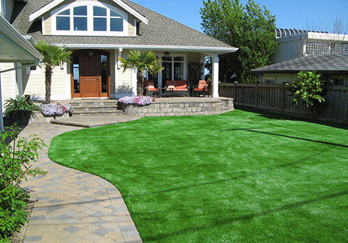 artificial grass lawn in residential front yard