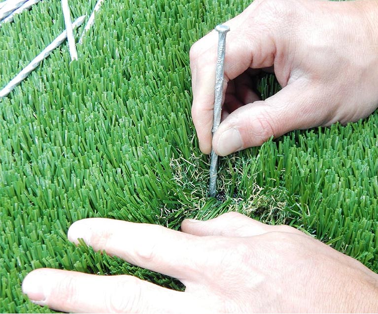 Spiking your artificial grass installation
