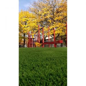 school playground play area on artificial grass field