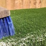 Do I need a power broom to infill my grass?