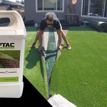 professional installing artficial grass in bakyard of home