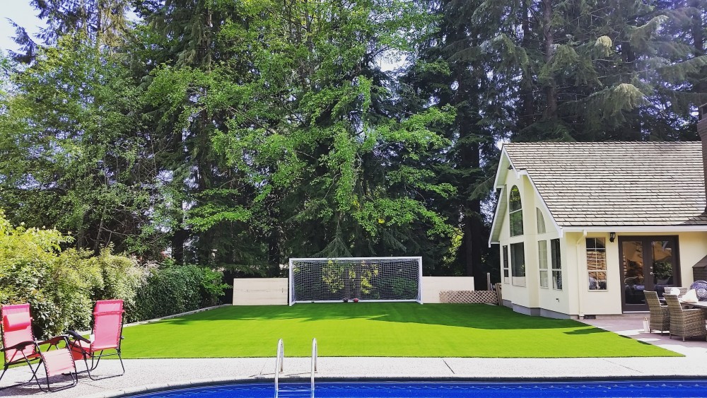 residential backyard with artificial grass